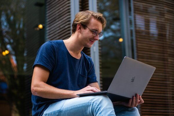 millennial writing his resume