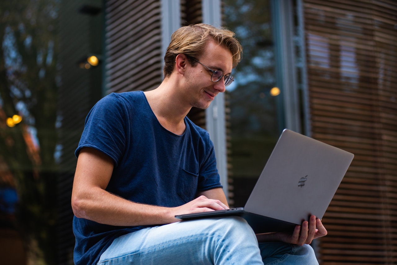 millennial writing his resume