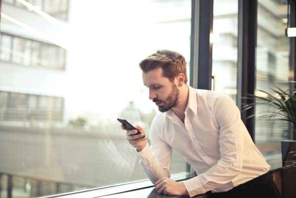man searching through online business directories